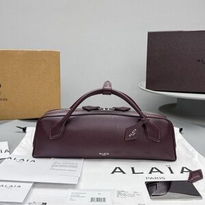 Alaia Burgundy Leather Clutch